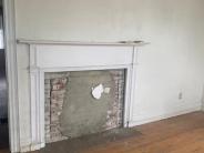 Fireplace - Fireplaces including this parlor fireplace, will be repointed and cleaned.