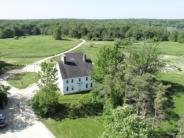 The 1804 Federal-style farmhouse with mid-19th century updates is a well-preserved example of local architecture 