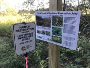 Habitat management signs at Oyster River Forest