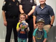 Deputy Chief Kelley, Det. Bolton & Off. Kilroy providing some guests a tour of the Durham Police Station